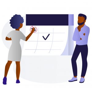 Black Man and Woman Working on Calendar